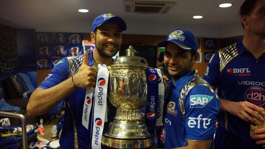 Parthiv Patel and Rohit Sharma with IPL 2015 Trophy Mumbai Indians with IPL 2015 Trophy,Mumbai Indians,Mumbai Indians IPL 2015,Mumbai Indians Win Second IPL Crown,Mumbai Indians Win Second IPL Trophy,Mumbai Indians lift the trophy,Rohit Sharma,Mumbai Indians saunter to second title win,Indian Premier Leagu