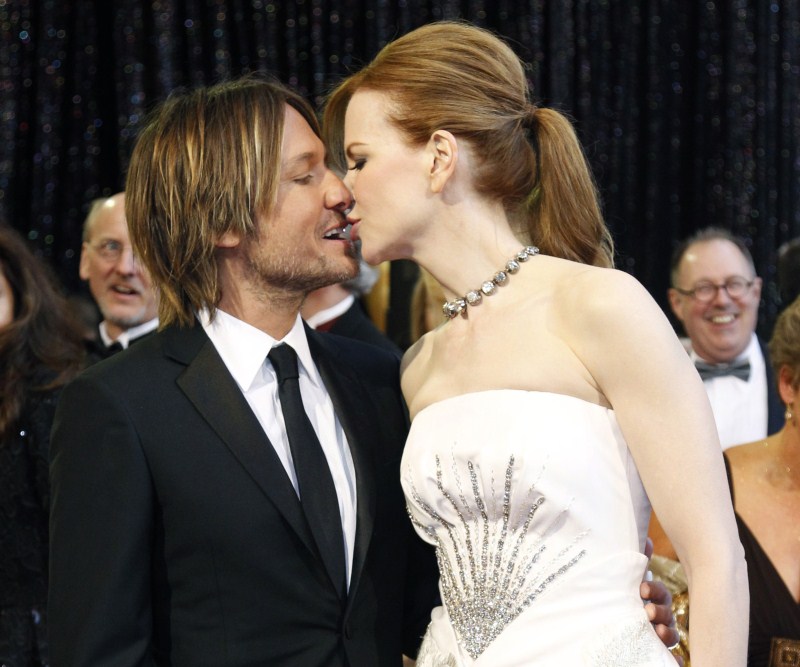 Singer Keith Urban kisses his wife actress Nicole Kidman as they arrive at the 83rd Academy Awards in Hollywood When the Stars Kiss,Stars Kiss,celebrities lock lips,lock lips,celebs lock lips,kiss the stars with me,kiss the stars horse,kiss the stars chords,Kiss the Stars,lip lock,hot kiss,hot kiss pics,hot kiss images,hot kiss stills