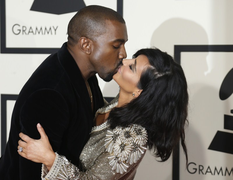 Kanye West and Kim Kardashian kiss on arrival at the 57th annual Grammy Awards When the Stars Kiss,Stars Kiss,celebrities lock lips,lock lips,celebs lock lips,kiss the stars with me,kiss the stars horse,kiss the stars chords,Kiss the Stars,lip lock,hot kiss,hot kiss pics,hot kiss images,hot kiss stills