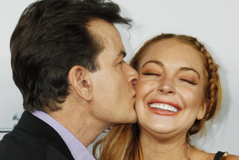 Cast member Charlie Sheen kisses co-star Lindsay Lohan on the cheek as they pose at the premiere of their new movie 'Scary Movie 5' in Hollywood When the Stars Kiss,Stars Kiss,celebrities lock lips,lock lips,celebs lock lips,kiss the stars with me,kiss the stars horse,kiss the stars chords,Kiss the Stars,lip lock,hot kiss,hot kiss pics,hot kiss images,hot kiss stills