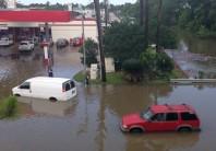 Vehicles are stranded by flood waters in south Houston, Texas