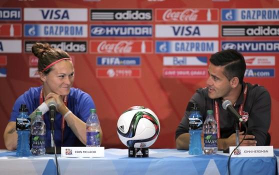 Canada goalkeeper Erin McLeod (left) and head coach John Herdman answer questions during a press conference