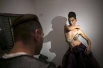 Karam Dadu, a transvestite homosexual Israeli Arab, prepares before a drag show in Tel Aviv