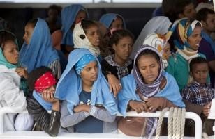 Migrants,Migrants at Sicilian harbour of Augusta,Migrants at Sicilian harbour,Sicilian harbour,Migrants wait to disembark,Sicilian harbour of August,Italy