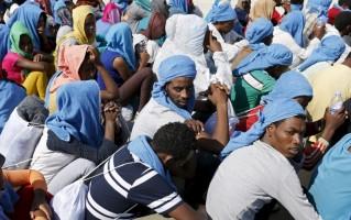 Migrants,Migrants at Sicilian harbour of Augusta,Migrants at Sicilian harbour,Sicilian harbour,Migrants wait to disembark,Sicilian harbour of August,Italy