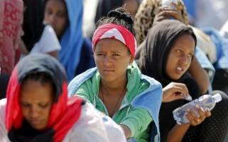 Migrants,Migrants at Sicilian harbour of Augusta,Migrants at Sicilian harbour,Sicilian harbour,Migrants wait to disembark,Sicilian harbour of August,Italy