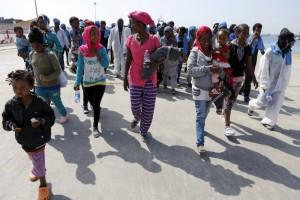 Migrants,Migrants at Sicilian harbour of Augusta,Migrants at Sicilian harbour,Sicilian harbour,Migrants wait to disembark,Sicilian harbour of August,Italy