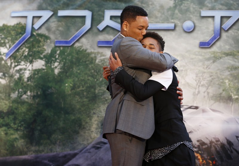 U.S. actor Will Smith (L) and his son Jaden Smith hug each other Fathers' Day,Fathers' Day 2015,Hollywood celebs with their Kids,celebs with their Kids,Happy Father's Day,dads and their kids,celebrities with their kids,celebrity kids