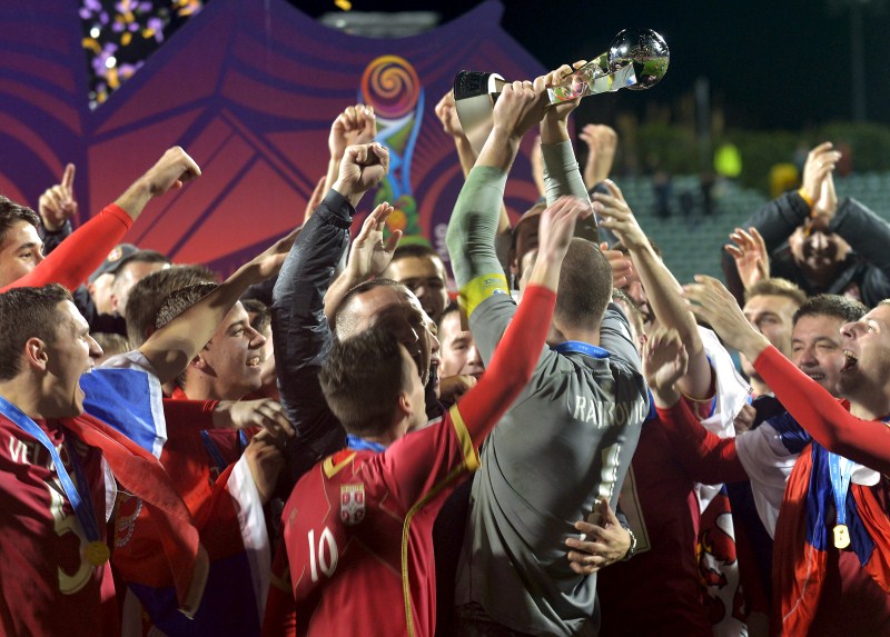 Members of the team from Serbia celebrate with the trophy Serbia beat Brazil,Serbia win U-20 World Cup,FIFA U-20 World Cup final,FIFA U-20 World Cup,Serbia wins U20 Soccer World Cup,Brazil,Brazil v Serbia,FIFA U-20 World Cup Final,FIFA U-20 World Cup 2015