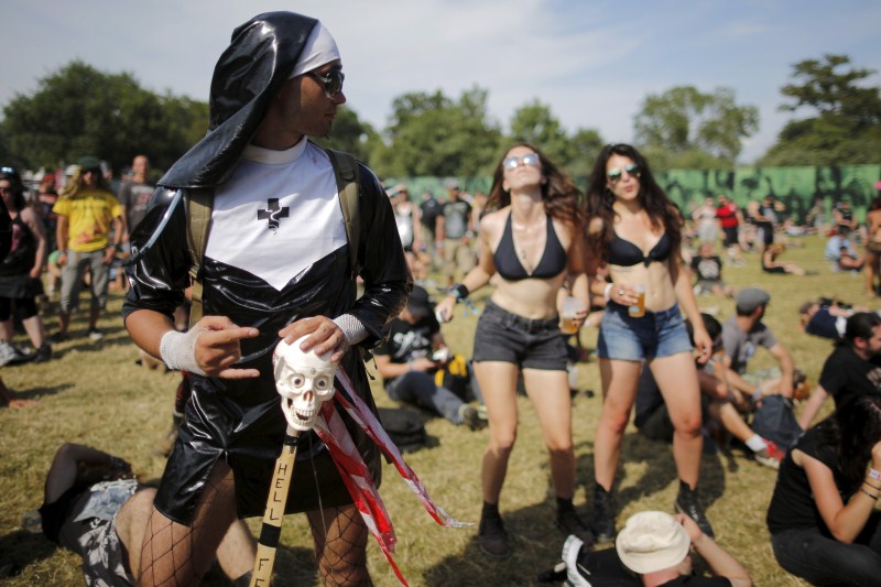 Festival-goers attend the Hellfest music Festival in Clisson, France Hellfest Music Festival,Hellfest Music Festival 2015 2015,Hellfest music Festival in Clisson,Music Festival,French music festival,Hellfest 2015,Hellfest Festival Hub,hellfest french music festival