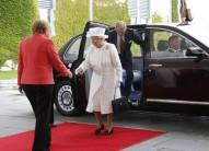 Britain's Queen Elizabeth and Prince Philip are greeted by German Chancellor Angela Merkel at the Chancellery in Berlin