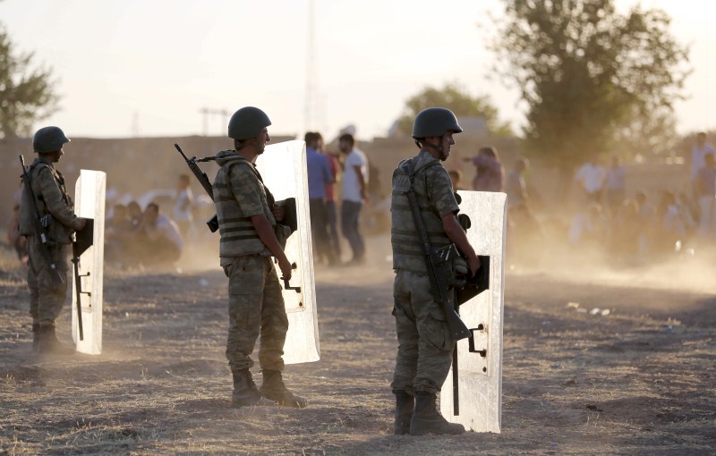 Turkish soldiers stand guard in the border town of Suruc in Sanliurfa province, Turkey ISIS Attacks,ISIS Attacks Kobani Again,Islamic State,ISIS militants,Syrian town,Islamic State attacks Kobani,Turkey,Sanliurfa province,Sanliurfa