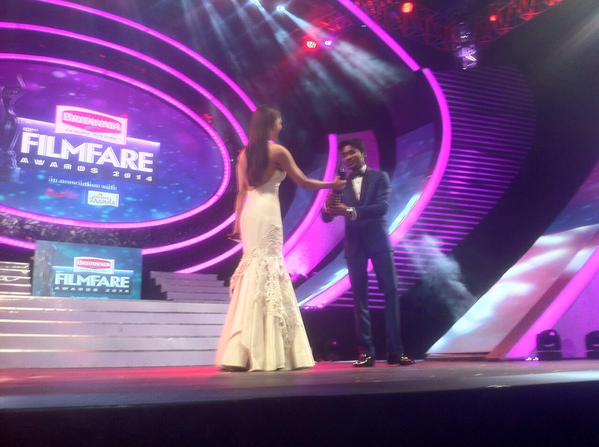 Kajal Agarwal presents the Best Actor Award to Dhanush Filmfare Awards,62nd Filmfare Awards South 2015,Filmfare Awards South 2015 Winners,Filmfare Awards South 2015,Filmfare Awards 2015,Filmfare Awards pics,Filmfare Awards images,Filmfare Awards photos,Filmfare Awards stills