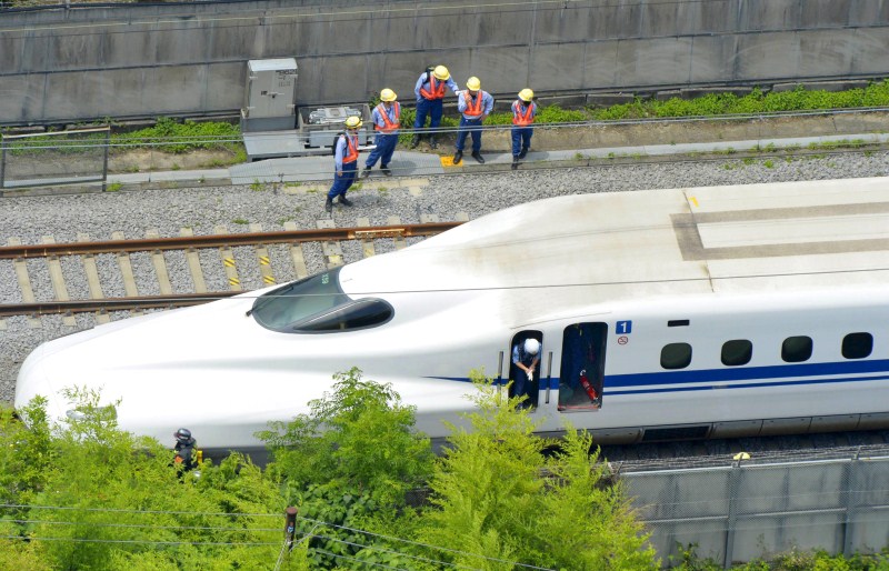 Japan bullet train 'self-immolation' fire kills two Peoples Japan bullet train,Japan bullet train 'self-immolation' fire kills two Peoples,Japan bullet train 'self-immolation',2 Dead After Self-Immolation,Japanese Bullet Train,bullet train south of Tokyo,Japan bullet train suicide