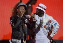 Pharrell Williams (L) and Sean 'Diddy' Coombs perform during the 2015 BET Awards