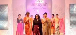 Kavya Madhavan walks the ramp with models during the launch of Laksyah.
