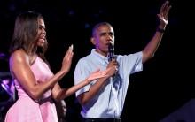 Barack Obama and Michelle Obama greet military families and guests during Independence Day celebration on the South Lawn of the White House in Washington.
