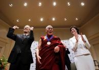 Dalai Lama reacts after receiving the National Endowment for Democracy's Democracy Service Medal.