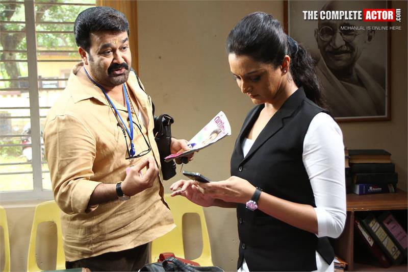 Mohanlal and Manju Warrier in 'Ennum Eppozhum' Mohanlal and Manju Warrier,Manju Warrier,Mohanlal,Ennum Eppozhum,Ennum Eppozhum stills,Ennum Eppozhum posters