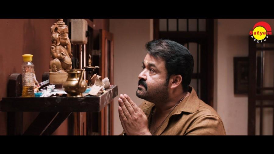Mohanlal in 'Ennum Eppozhum' Mohanlal and Manju Warrier,Manju Warrier,Mohanlal,Ennum Eppozhum,Ennum Eppozhum stills,Ennum Eppozhum posters