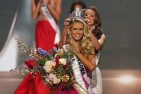 Olivia Jordan of Oklahoma is crowned by Miss USA 2014 Nia Sanchez after winning the 2015 Miss USA beauty pageant in Baton Rouge