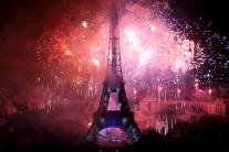 Fireworks light up the sky near the Eiffel Tower to end the traditional Bastille Day celebrations in Paris