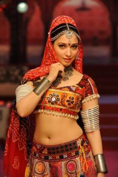Photos of South Indian Actress Tamannaah stills from VSOP Movie.