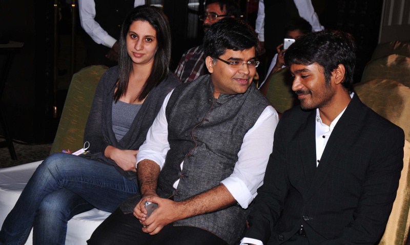 Dhanush and Jitesh Pillaai (Editor, Filmfare Magazine) at the '62nd Britannia Filmfare South Awards' special issue launch at The Leela Palace. Dhanush,Dhanush on the cover of special edition of Filmfare South,Dhanush and Jitesh Pillaai,Jitesh Pillaai,Filmfare South,Dhanush unveils the Filmfare cover,Dhanush on Filmfare cover,Filmfare cover page,Dhanush latest pics,Dhanush latest images,Dhanush l