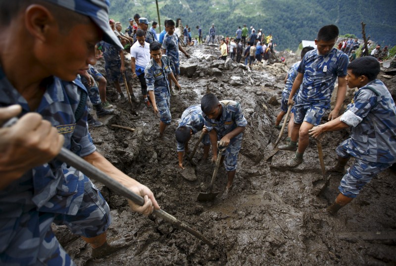 Landslides triggered by torrential rain in Nepal swept through villages on Thursday, killing at least 30 people close to the nation’s most popular trekking circuit. Nepal Landslides triggered by Rain,Landslides in Nepal,Landslides,Kaski district,Nepal,Landslides bury Nepal villages,Landslides in Western Nepal,heavy rain,heavy rain in Nepal