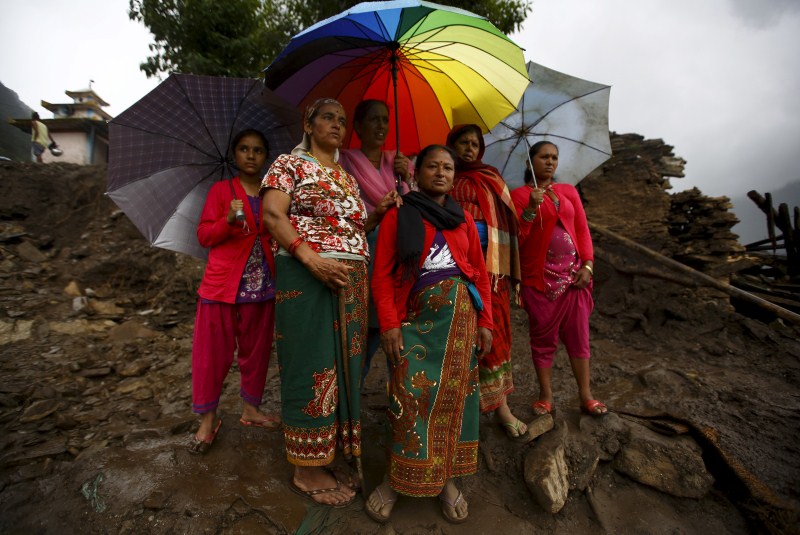 Landslides triggered by torrential rain in Nepal swept through villages on Thursday, killing at least 30 people close to the nation’s most popular trekking circuit. Nepal Landslides triggered by Rain,Landslides in Nepal,Landslides,Kaski district,Nepal,Landslides bury Nepal villages,Landslides in Western Nepal,heavy rain,heavy rain in Nepal