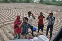 Food packets being dropped by IAF MI-17 V5 helicopter in the flood affected villages of North Gujarat