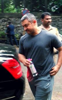 Bollywood Actor Aamir Khan snapped coming out of a Massage Parlour in Bandra.