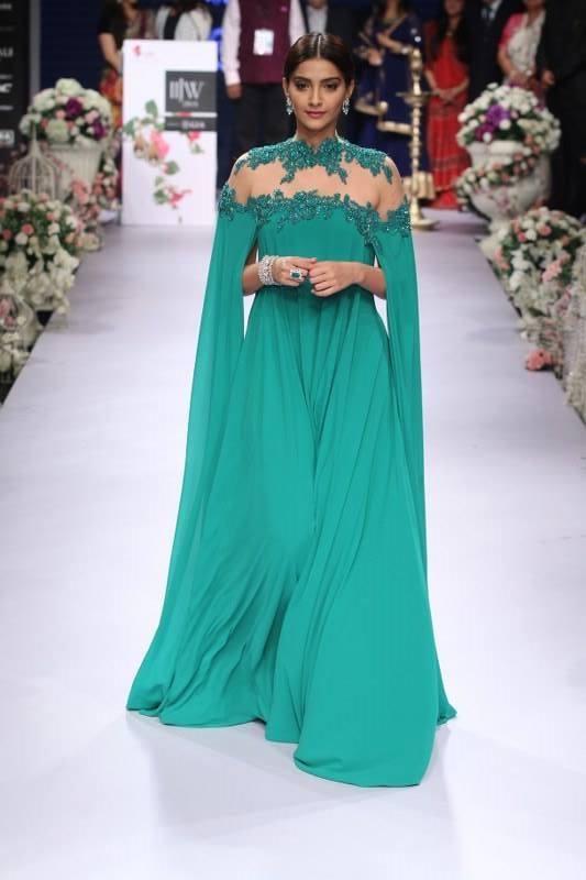 Bollywood Actress Sonam Kapoor takes our breath away in a stunning Michael Costello Gown. Sonam Kapoor,Actress Sonam Kapoor,Sonam Kapoor at IIJW 2015 Inauguration Ceremony,Sonam Kapoor at IIJW 2015,IIJW 2015,Sonam Kapoor latest pics,Sonam Kapoor latest images,Sonam Kapoor latest photos,Sonam Kapoor latest stills,Sonam Kapoor latest pictures