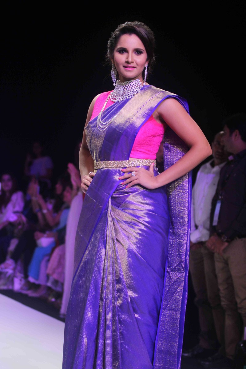 Indian Tennis Player Sania Mirza walks the ramp at India International Jewellery Week. Sania Mirza,Sania Mirza walks the ramp at India International Jewellery Week,Sania Mirza at India International Jewellery Week,IIJW 2015,IIJW,Sania Mirza at IIJW,Sania Mirza latest pics,Sania Mirza latest images,Sania Mirza latest photos,Sania Mirza lates