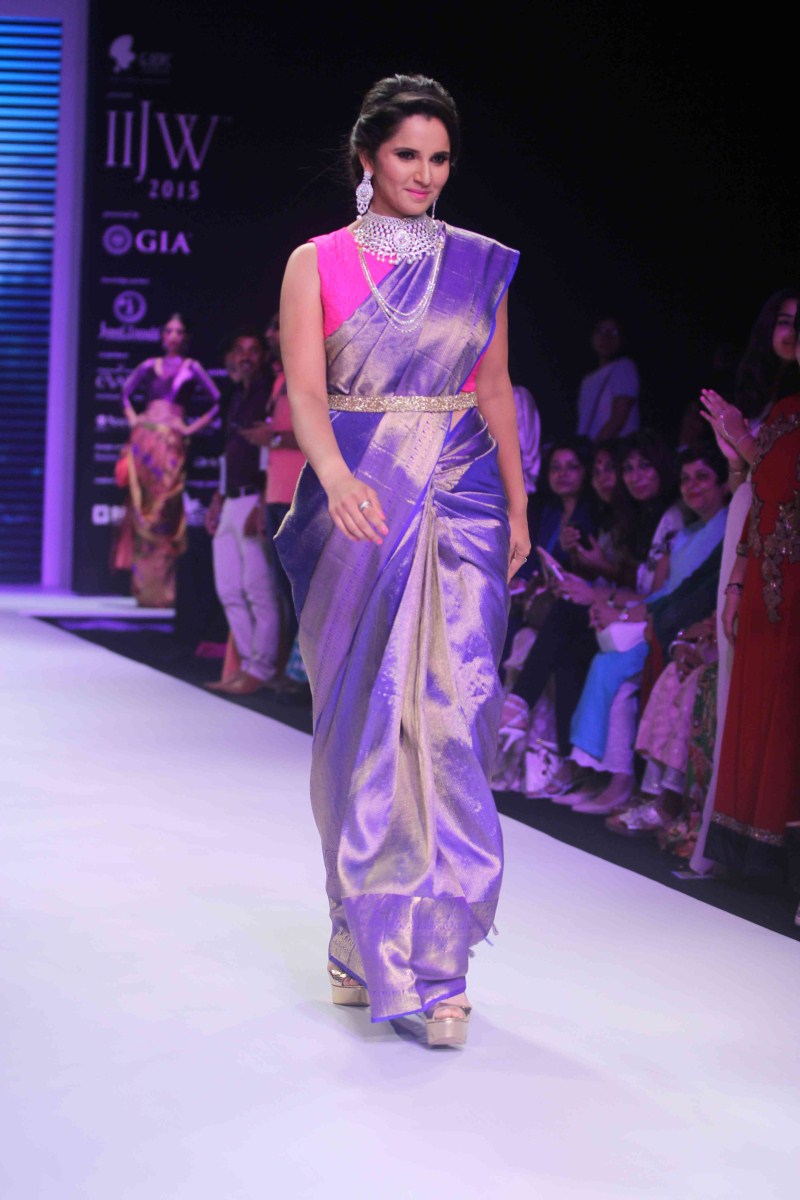 Indian Tennis Player Sania Mirza walks the ramp at India International Jewellery Week. Sania Mirza,Sania Mirza walks the ramp at India International Jewellery Week,Sania Mirza at India International Jewellery Week,IIJW 2015,IIJW,Sania Mirza at IIJW,Sania Mirza latest pics,Sania Mirza latest images,Sania Mirza latest photos,Sania Mirza lates