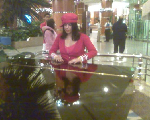 Self-styled godwoman from Punjab Radhe Maa is being sued for obscenity. Her photos wearing short pink dress has gone viral. Radhe Maa,Radhe Maa photo,Hot radhe maa photos,Radhe maa in dress photos,Indian godwoman,godwoman,Radhe maa pictures,Radhe maa criminal case,goddess