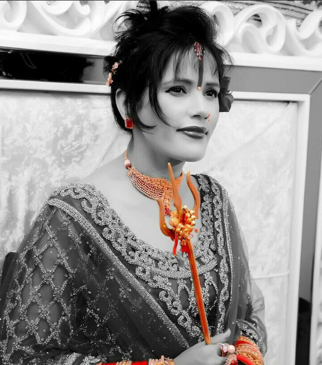 Self-styled godwoman from Punjab Radhe Maa is being sued for obscenity. Her photos wearing short pink dress has gone viral. Radhe Maa,Radhe Maa photo,Hot radhe maa photos,Radhe maa in dress photos,Indian godwoman,godwoman,Radhe maa pictures,Radhe maa criminal case,goddess