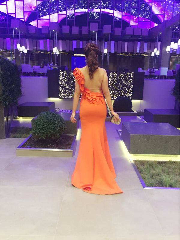 Check out photos of Raai Laxmi attending SIIMA Awards 2015 in Dubai. Siima awards 2015,raai laxmi,rai lakshmi,lakshmi rai in dubai,raai laxmi siima dress,raai laxmi siima orange gown