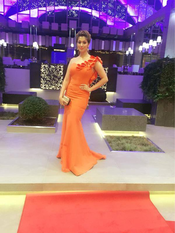Check out photos of Raai Laxmi attending SIIMA Awards 2015 in Dubai. Siima awards 2015,raai laxmi,rai lakshmi,lakshmi rai in dubai,raai laxmi siima dress,raai laxmi siima orange gown