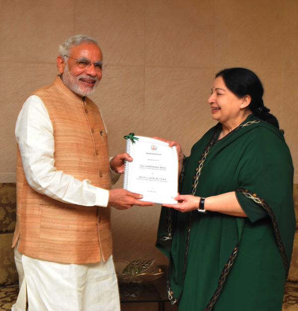 Prime Minister Narendra Modi inaugurated the first National Handloom Day at the Centenary Hall of Madras University in Chennai at a function organised by the Tamil Nadu government's textile ministry on Friday. Narendra Modi,Narendra Modi with Jayalalitha,Jayalalitha,Narendra Modi with Jayalalitha at Poes Garden,Modi,Lunch Pe Charcha
