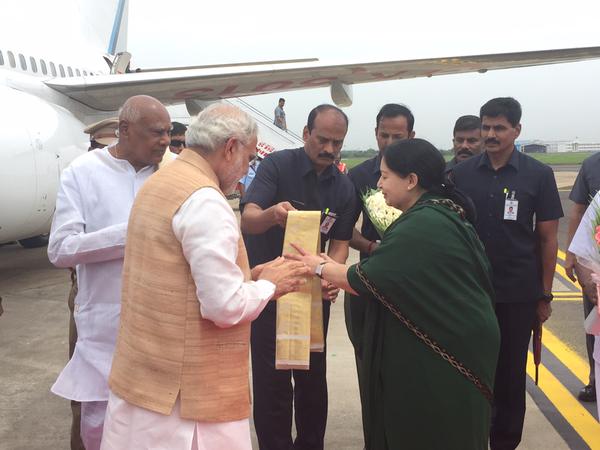 Prime Minister Narendra Modi inaugurated the first National Handloom Day at the Centenary Hall of Madras University in Chennai at a function organised by the Tamil Nadu government's textile ministry on Friday. Narendra Modi,Narendra Modi with Jayalalitha,Jayalalitha,Narendra Modi with Jayalalitha at Poes Garden,Modi,Lunch Pe Charcha