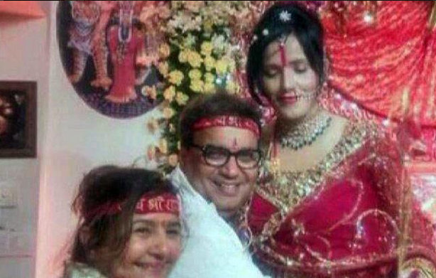 Controversial godwoman Radhe Maa with Subhash Gai and other celebrities, who are her devotees Radhe Maa,Radhe maa photos,Radhe maa photos with subhas gai,subhash ghai defends radhe maa,Radhe maa in dress,Radhe Maa in mini skirt,radhe maa hot pics,hot photos of radhe maa,Film Director Subhash Ghai hugging Radhe Maa,viral photos,FTII Chairman Gajend