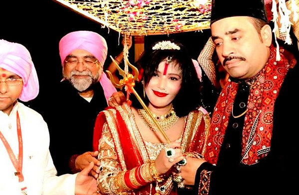 Controversial godwoman Radhe Maa with Subhash Gai and other celebrities, who are her devotees Radhe Maa,Radhe maa photos,Radhe maa photos with subhas gai,subhash ghai defends radhe maa,Radhe maa in dress,Radhe Maa in mini skirt,radhe maa hot pics,hot photos of radhe maa,Film Director Subhash Ghai hugging Radhe Maa,viral photos,FTII Chairman Gajend