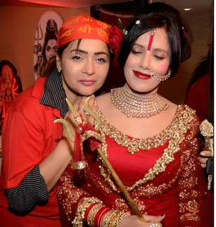 Controversial godwoman Radhe Maa with Subhash Gai and other celebrities, who are her devotees Radhe Maa,Radhe maa photos,Radhe maa photos with subhas gai,subhash ghai defends radhe maa,Radhe maa in dress,Radhe Maa in mini skirt,radhe maa hot pics,hot photos of radhe maa,Film Director Subhash Ghai hugging Radhe Maa,viral photos,FTII Chairman Gajend