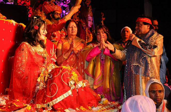 Controversial godwoman Radhe Maa with Subhash Gai and other celebrities, who are her devotees Radhe Maa,Radhe maa photos,Radhe maa photos with subhas gai,subhash ghai defends radhe maa,Radhe maa in dress,Radhe Maa in mini skirt,radhe maa hot pics,hot photos of radhe maa,Film Director Subhash Ghai hugging Radhe Maa,viral photos,FTII Chairman Gajend