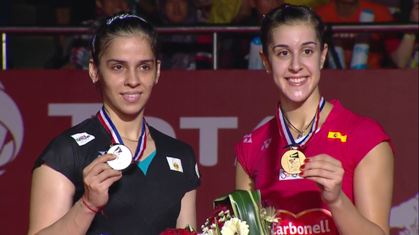 Saina Nehwal lost to world number one Carolina Marin in the final of the World Badminton. BWF World Championships Final,World Badminton Championship Final,World Badminton Championship,Saina Nehwal,Saina Nehwal Loses to Carolina Marin,Carolina Marin,Badminton,Saina Nehwal silver medial,silver medial