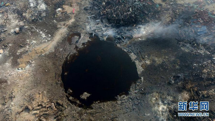 Tianjin blast in China at a warehouse storing dangerous chemical has killed over 100 people. Tianjin Blast,Tianjin blasts,tianjin crater,crater at tianjin blast site,huge crater,tianjin,china blast,tianjin explosion pictures,china chemical factory blast