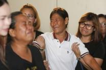 Relatives cry as they remove the body of Suwan Sudmun, a Thai victim of Monday's bomb blast, at the Institute of Forensic Medicine in Bangkok, Thailand, August 18, 2015. Thai authorities said on Tuesday they were looking for a suspect seen on closed-circuit television (CCTV) footage near the renowned shrine where a bomb blast killed 22 people, including nine foreigners from several Asian countries.