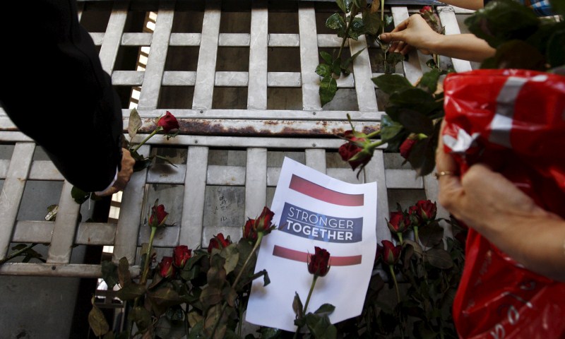 Relatives cry as they remove the body of Suwan Sudmun, a Thai victim of Monday's bomb blast, at the Institute of Forensic Medicine in Bangkok, Thailand, August 18, 2015. Thai authorities said on Tuesday they were looking for a suspect seen on closed-circuit television (CCTV) footage near the renowned shrine where a bomb blast killed 22 people, including nine foreigners from several Asian countries. Bangkok Blast,Mourning Kin of Victims,Mourning Bangkok Bomb Victims,Bangkok Bomb Victims,Mourning