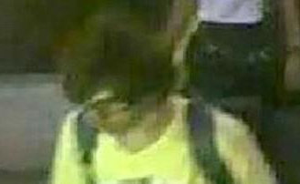 Thai police have release the image of the man behind the Bangkok bomb blast. The man, wearing yellow shirt and black rimmed-glasses, is seen placing bag at Erawan Shrine containing the bomb. Bangkok blast bomber,bangkok blast,photos,bangkok blast bomber pictures,bangkok bomber,blast,Erawan Shrine bomb blast,Erawan Shrine,Thailand bomb blast,bomb blast